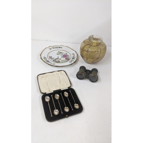 194 - A set of six silver coffee spoons, a Mdina vase, opera glasses and a plate
Location: 6.4

If there i... 