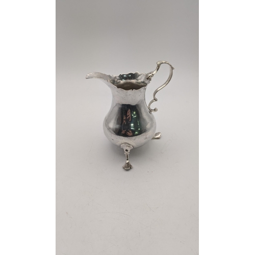 119 - A George III silver cream jug, hallmarked London 1767, 80.6g, makers mark A.N.SA
Location:T

If ther... 