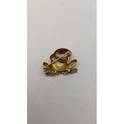 146 - A gold frog brooch tested as 9ct, together with a 9ct gold pendant, along with a gold plated and pea... 