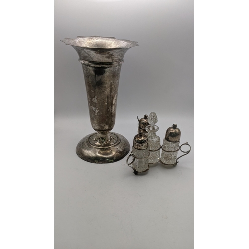 147 - A large silver weighted tulip vase, 22cm h hallmarked Birmingham 1911, together with a silver and cr... 