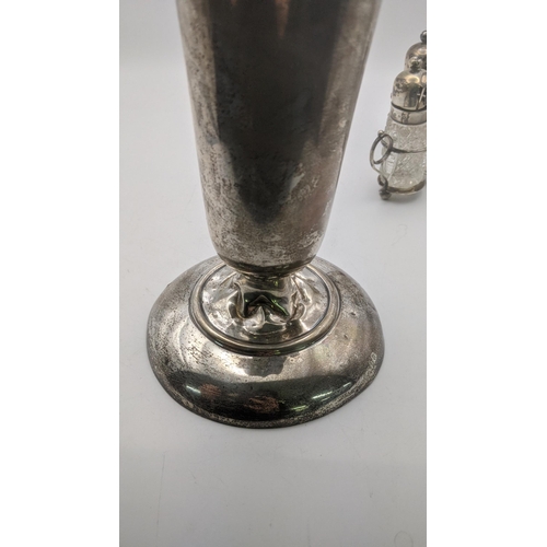 147 - A large silver weighted tulip vase, 22cm h hallmarked Birmingham 1911, together with a silver and cr... 