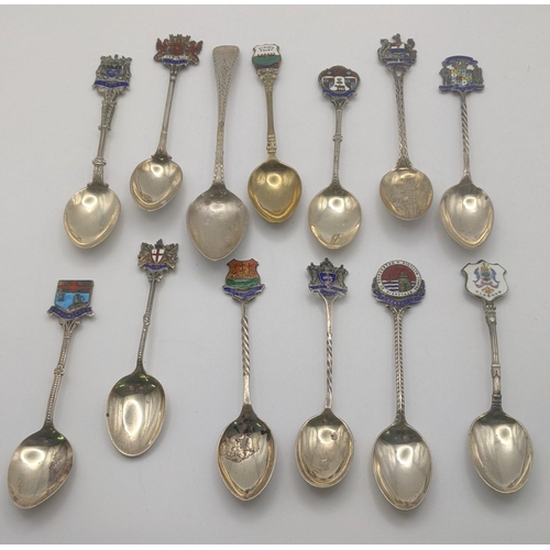 202A - Eleven silver collectors tea spoons, some with twisted terminals and decorated with enamel, to inclu... 