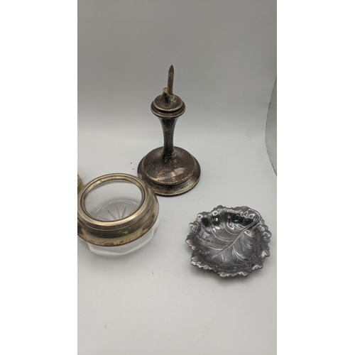 216 - Silver to include two dressing table brushes with engine turned design, a silver rimmed pot, a pin d... 