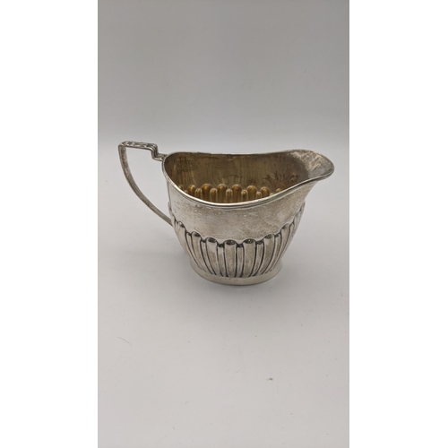 218 - A silver milk jug, 116.5g
Location: R2.3

If there is no condition report shown, please request