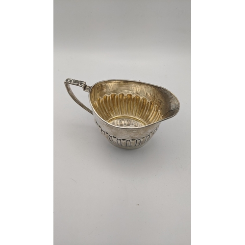 218 - A silver milk jug, 116.5g
Location: R2.3

If there is no condition report shown, please request