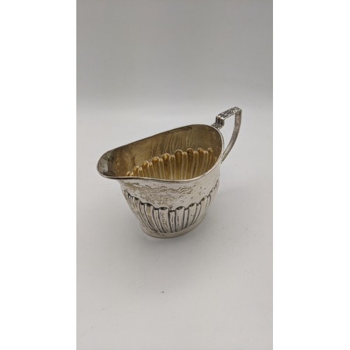 218 - A silver milk jug, 116.5g
Location: R2.3

If there is no condition report shown, please request