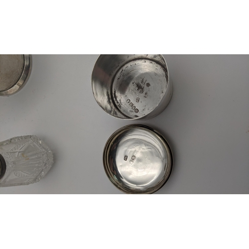 224 - Silver to include various condiment pots, two pepper pots, a crystal cut glass scent bottle and othe... 