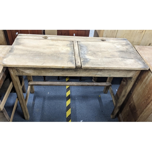 251 - A Victorian beech double school desk with inkwells and two hinged lids 76cm h x 103cm w Location: A3... 