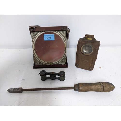 288 - A leather cased travelling mirror, torch, soldering iron, La Fontaine Royal Palais opera glasses, an... 