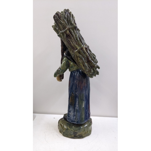 313 - A circa 1900 Majolica large figure fashioned as an elderly peasant lady, 47cm h
Location: 10.1

If t... 