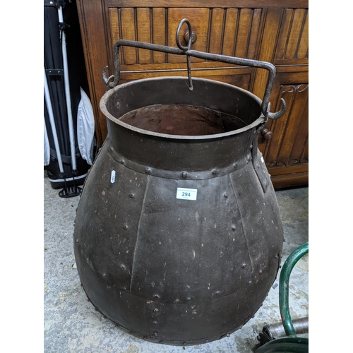 294 - A riveted iron hanging cauldron/garden planter, 67cm high (excluding suspension hook) Location: G
If... 