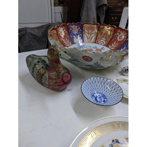 343 - A mixed lot to include a large Japanese Satsuma bowl, a model of a gentleman and dog standing with d... 