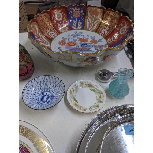 343 - A mixed lot to include a large Japanese Satsuma bowl, a model of a gentleman and dog standing with d... 