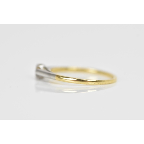 291 - A 18ct yellow gold and platinum solitaire diamond ring, the diamond approx 2.6mm surface diameter an... 