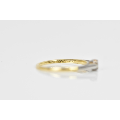 291 - A 18ct yellow gold and platinum solitaire diamond ring, the diamond approx 2.6mm surface diameter an... 