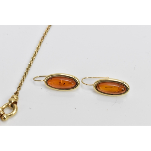 296 - A 14ct yellow gold and amber necklace with matching earrings, the necklace having a spiga chain with... 