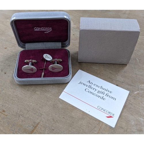 337 - Concorde related collectables to include a pair of cufflinks and a tie pin stamped 'Silver' embossed... 