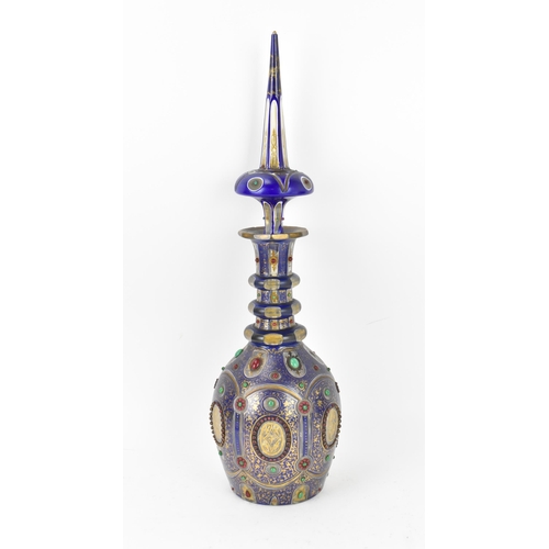 35 - A large 19th century bohemian flash overlay and jewelled cut glass decanter, in cobalt blue overlay ... 