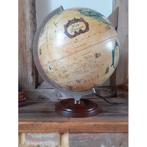 250 - A 1992 Danish Scan-Globe Legend World Discoverer light-up globe, pat-tested, having a wooden base an... 