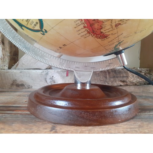 250 - A 1992 Danish Scan-Globe Legend World Discoverer light-up globe, pat-tested, having a wooden base an... 