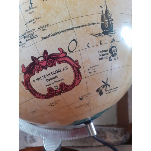 250 - A 1992 Danish Scan-Globe Legend World Discoverer light-up globe, pat-tested, having a wooden base an... 