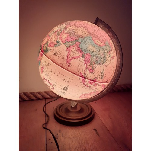 250 - A 1992 Danish Scan-Globe Legend World Discoverer light-up globe, pat-tested, having a wooden base an... 