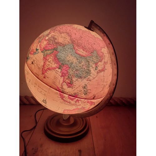 250 - A 1992 Danish Scan-Globe Legend World Discoverer light-up globe, pat-tested, having a wooden base an... 