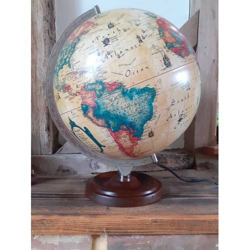 250 - A 1992 Danish Scan-Globe Legend World Discoverer light-up globe, pat-tested, having a wooden base an... 