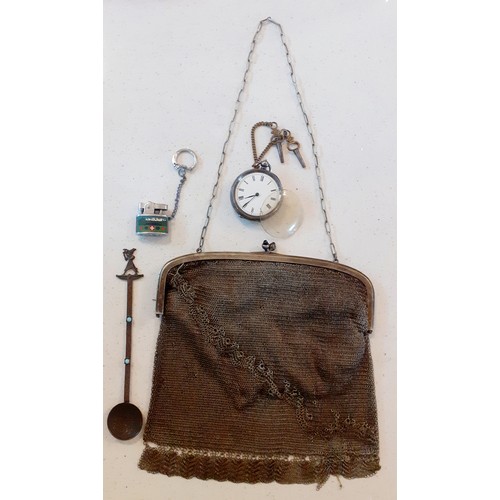 57 - An early 20th Century white metal chain bag A/F with acorn style fastening, a copper coloured teaspo... 