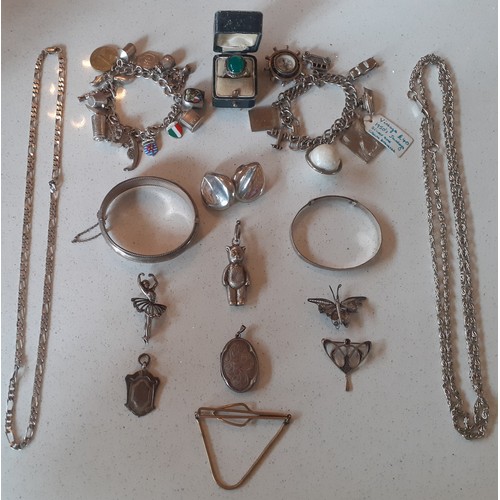 37 - Vintage costume jewellery, mainly silver, to include an engraved hinged silver bangle with safety ch... 