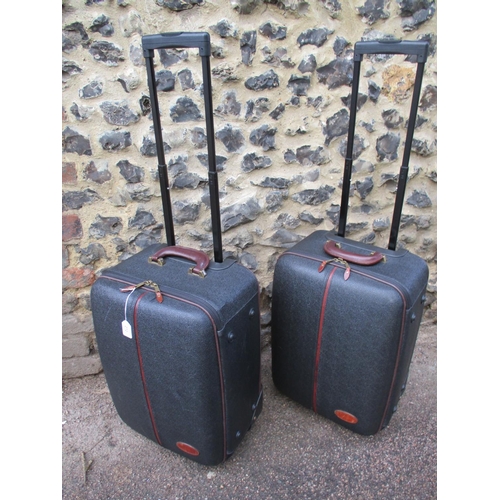 3 - Mulberry- A pair of Scotchgrain wheelie suitcases, one having a luggage tag with serial number on gi... 