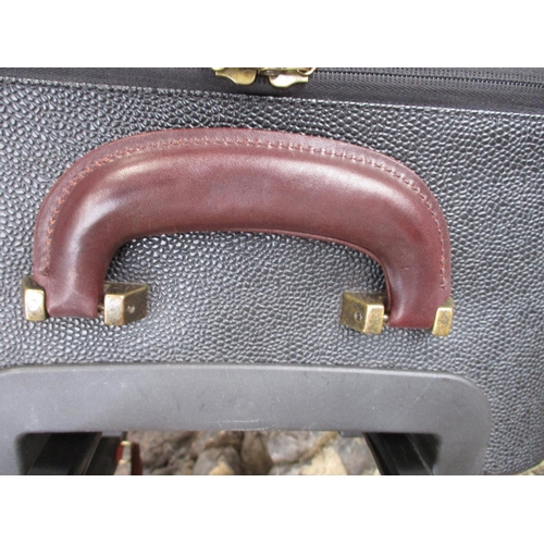 3 - Mulberry- A pair of Scotchgrain wheelie suitcases, one having a luggage tag with serial number on gi... 