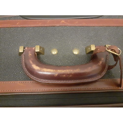 1 - Mulberry- A large Scotchgrain hard-cased wheelie suitcase, 30