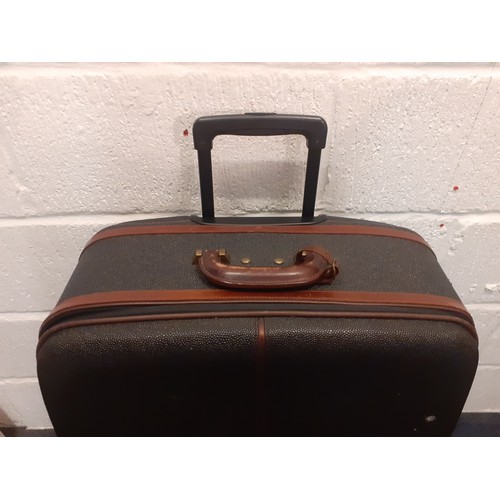 1 - Mulberry- A large Scotchgrain hard-cased wheelie suitcase, 30