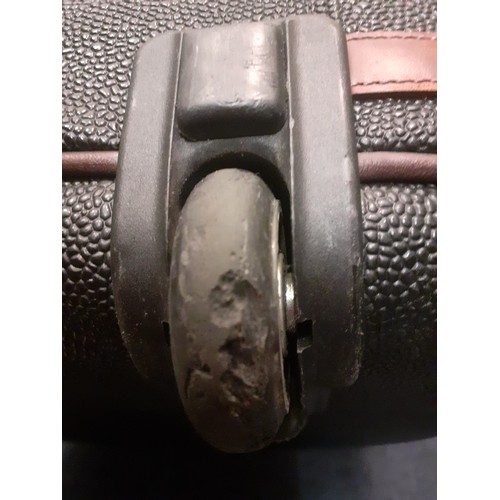 1 - Mulberry- A large Scotchgrain hard-cased wheelie suitcase, 30