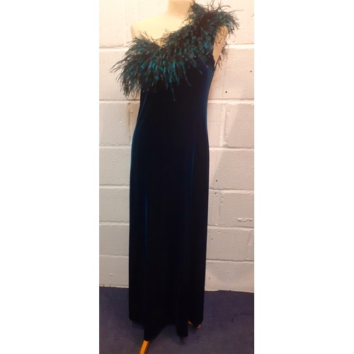 12 - Gina Bacconi-A teal one-shoulder velveteen evening dress with teal ostrich feather neckline, UK size... 