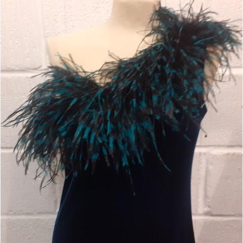 12 - Gina Bacconi-A teal one-shoulder velveteen evening dress with teal ostrich feather neckline, UK size... 