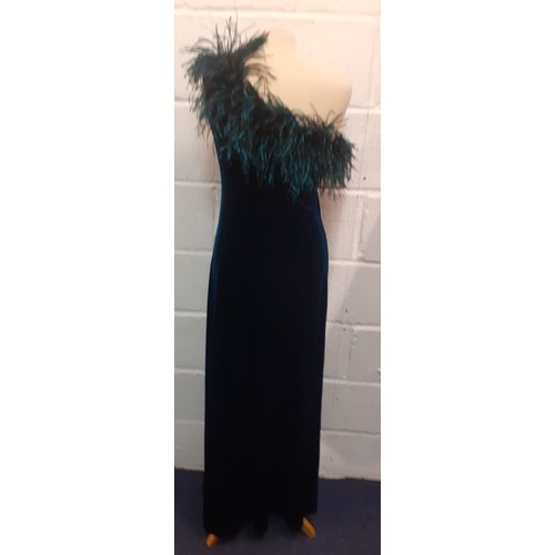 12 - Gina Bacconi-A teal one-shoulder velveteen evening dress with teal ostrich feather neckline, UK size... 