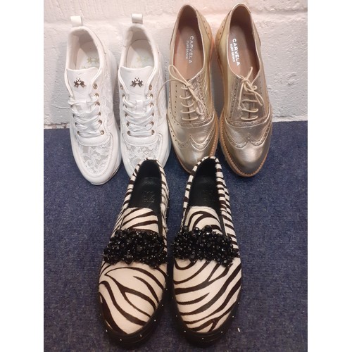 59 - Three pairs of ladies leisure shoes comprising a pair of hardly worn gold Carvela for Kurt Geiger Eu... 