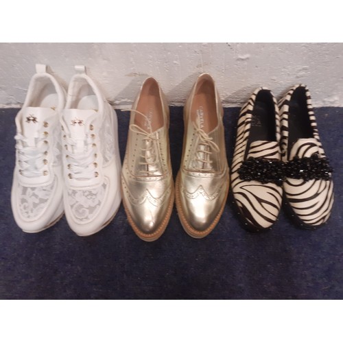 59 - Three pairs of ladies leisure shoes comprising a pair of hardly worn gold Carvela for Kurt Geiger Eu... 