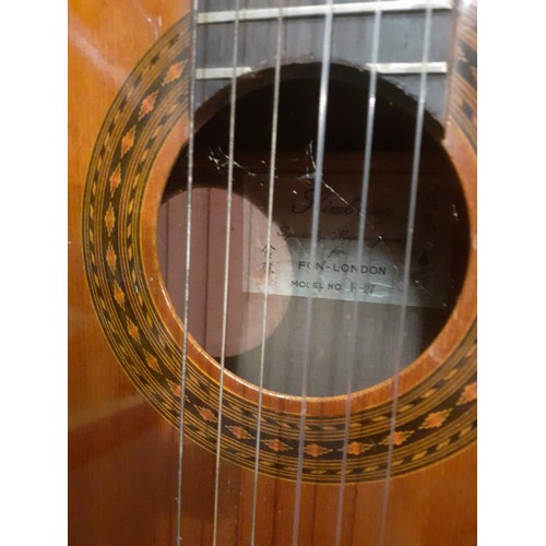 200 - A Kimbara acoustic 6-string guitar model no:N-27 together with a British Made Banjo A/F in case. Loc... 