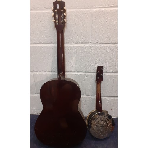 200 - A Kimbara acoustic 6-string guitar model no:N-27 together with a British Made Banjo A/F in case. Loc... 