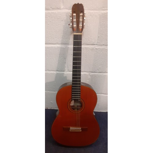 197 - A Kimbara 6-string acoustic guitar made in Japan, model no:28 together with a soft travel case. Loca... 