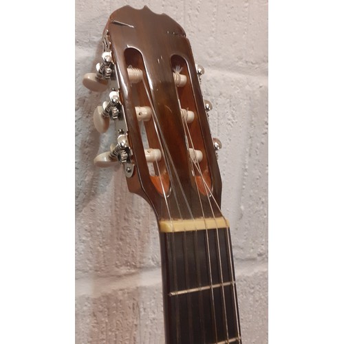 197 - A Kimbara 6-string acoustic guitar made in Japan, model no:28 together with a soft travel case. Loca... 