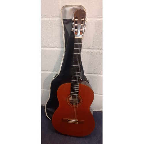 197 - A Kimbara 6-string acoustic guitar made in Japan, model no:28 together with a soft travel case. Loca... 