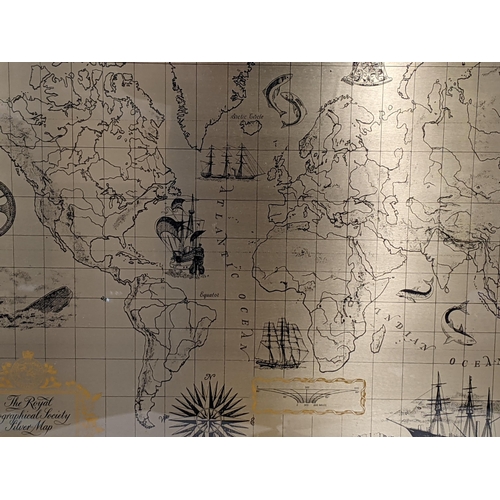 300 - The Royal Geographical Society Silver map of the world, hallmarks to the bottom right hand side of t... 