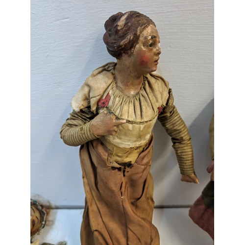 1 - Four 19th Century Neapolitan crib figures A/F and a 1920's wax figure A/F
Location: R2-2

If there i... 