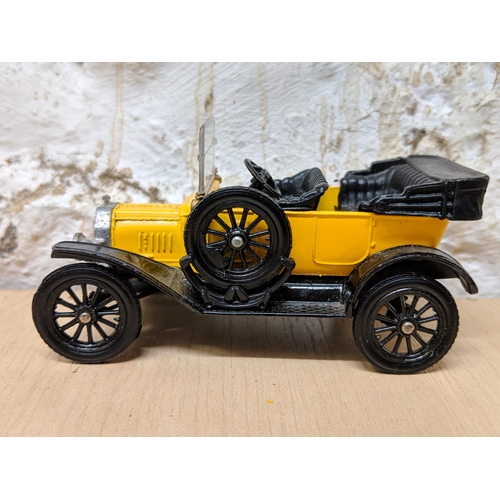 11 - Four Corgi classics to include three 1915 Ford Model T's 901,9013,9012 and a 1927 Bentley Le Mans an... 