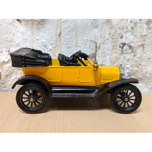 11 - Four Corgi classics to include three 1915 Ford Model T's 901,9013,9012 and a 1927 Bentley Le Mans an... 