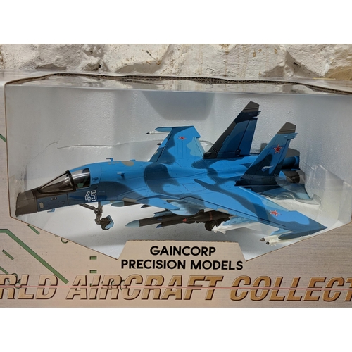 12 - Three Gaincorp precision models from the 'World Aircraft collection' to include a Sukhoi SU-32 FN St... 